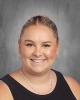 Ms. Whyte, a female teacher wearing a black shirt