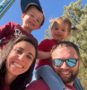 Picture of Mr. Griffith with his wife, and two children wearing Colorado Avalanche gear.